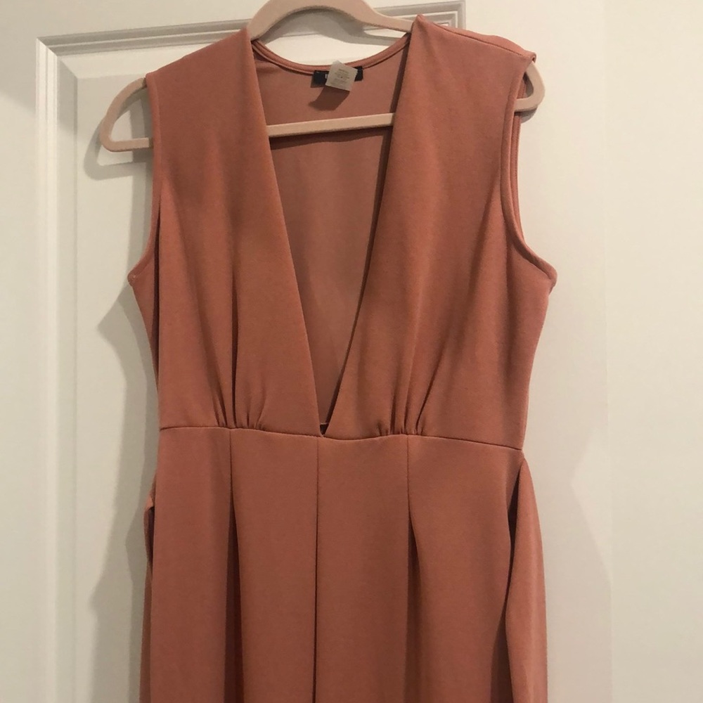 Dusty pink jumpsuit never worn before, but has no tags on it.